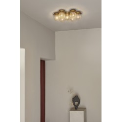 Nuura – Liila Star wall / ceiling lamp, nordic gold and clear glass