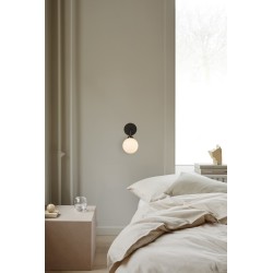 Nuura – Apiales wall lamp, satin black and white opal glass